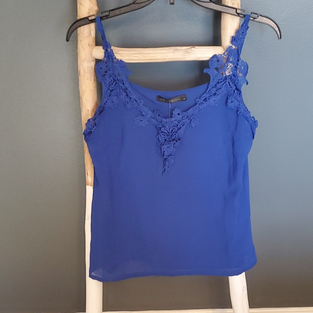 blue lace sleeveless top. V-neckline thin spaghetti straps NWT Medium
